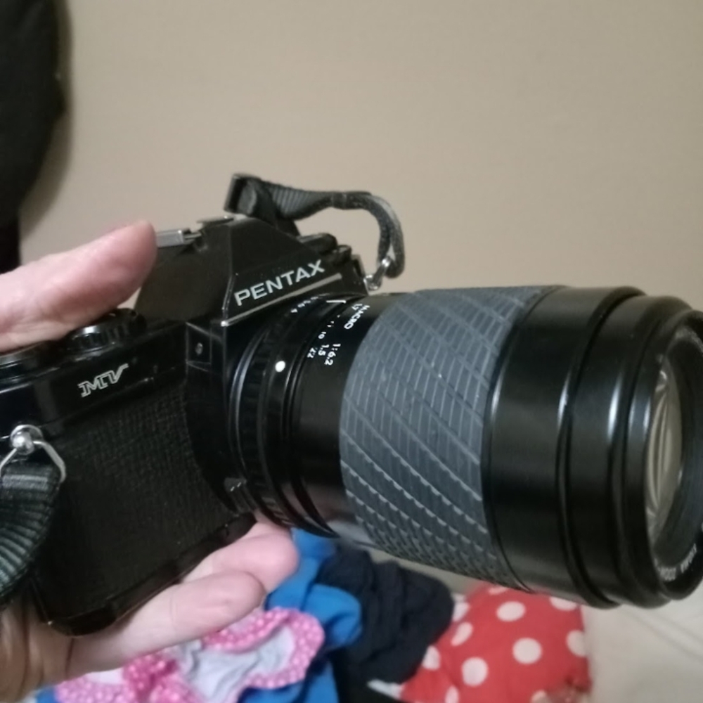 Pentax Black Digital Camera with Telephoto Lens